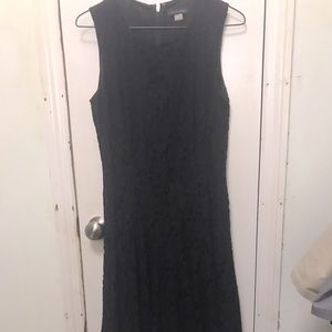 Knee length semi fitted black lace dress